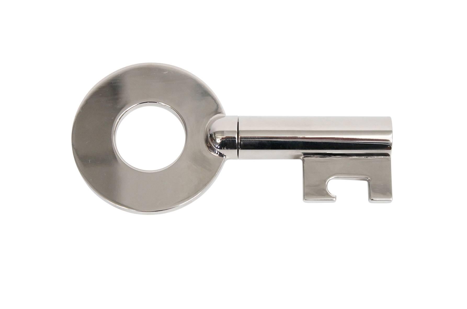 Carl Auböck designed key shaped bottle opener and corkscrew. Model No. 5920. This example in rare and chic nickel over brass finish.
   
