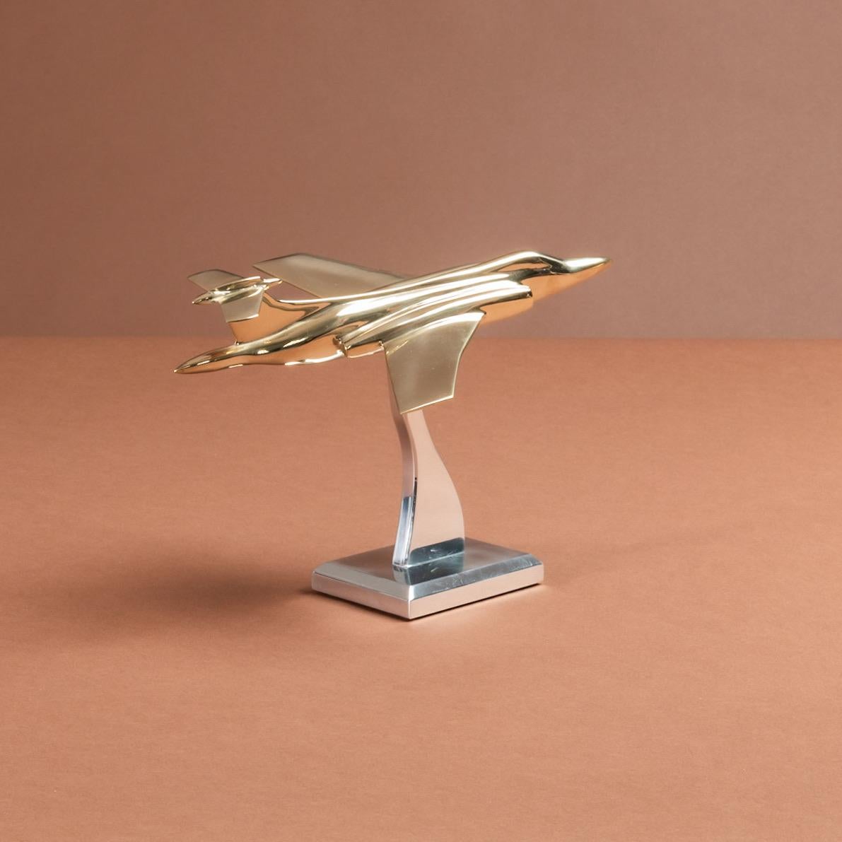 A polished cast brass model of an S.2 Buccaneer jet, circa 1965. Mounted on newly made polished aluminium stand.

Dimensions: 18cm/ 7⅛ inches (wingspan) x  26cm/ 10¼ inches (length) x 18cm/ 7⅛ inches (height on stand).

What was the Blackburn S.2
