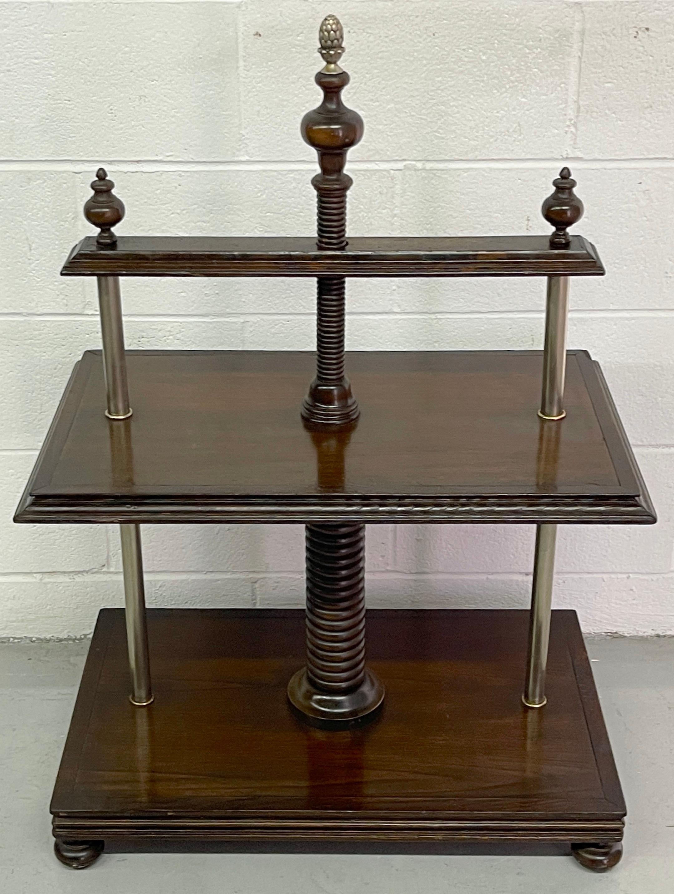 Model of a European bookpress end/side table 
Europe, 20th Century 
A model of a European book binding press made of hardwood with turned wood faux clamps, with silverplated bronze acorn finial at the top. This is a non-functional bookpress, this