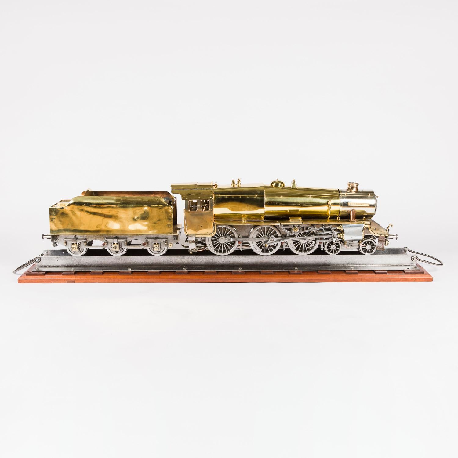 3 ½ inch gauge model of the 4-6-0 steam locomotive the Black Knight. Circa 1955.

Mounted on a display track.

Length of Locomotive: 31 inches - 79 cm.

Length of Tender: 19 inches - 48 cm.

Length of display track: 56 1/4 inches -143 cm. 

 

The