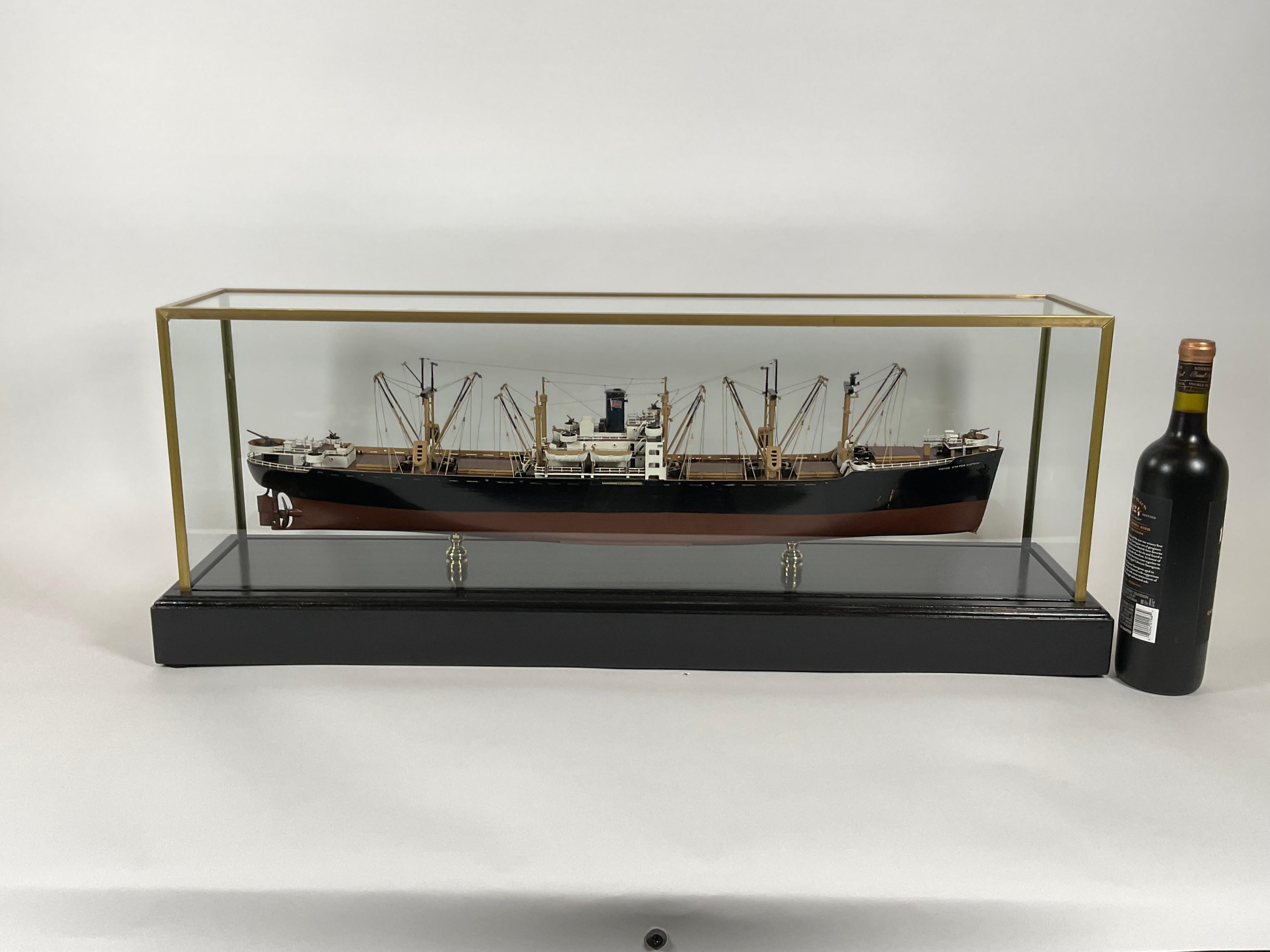 Professionally built model of the American merchant ship “United States Victory”. The model has masts, booms, hatches, super structure, bitts, cleats, rigging, etc. Mounted into a glass display case. Possibly by Van Ryper. This is a stately model