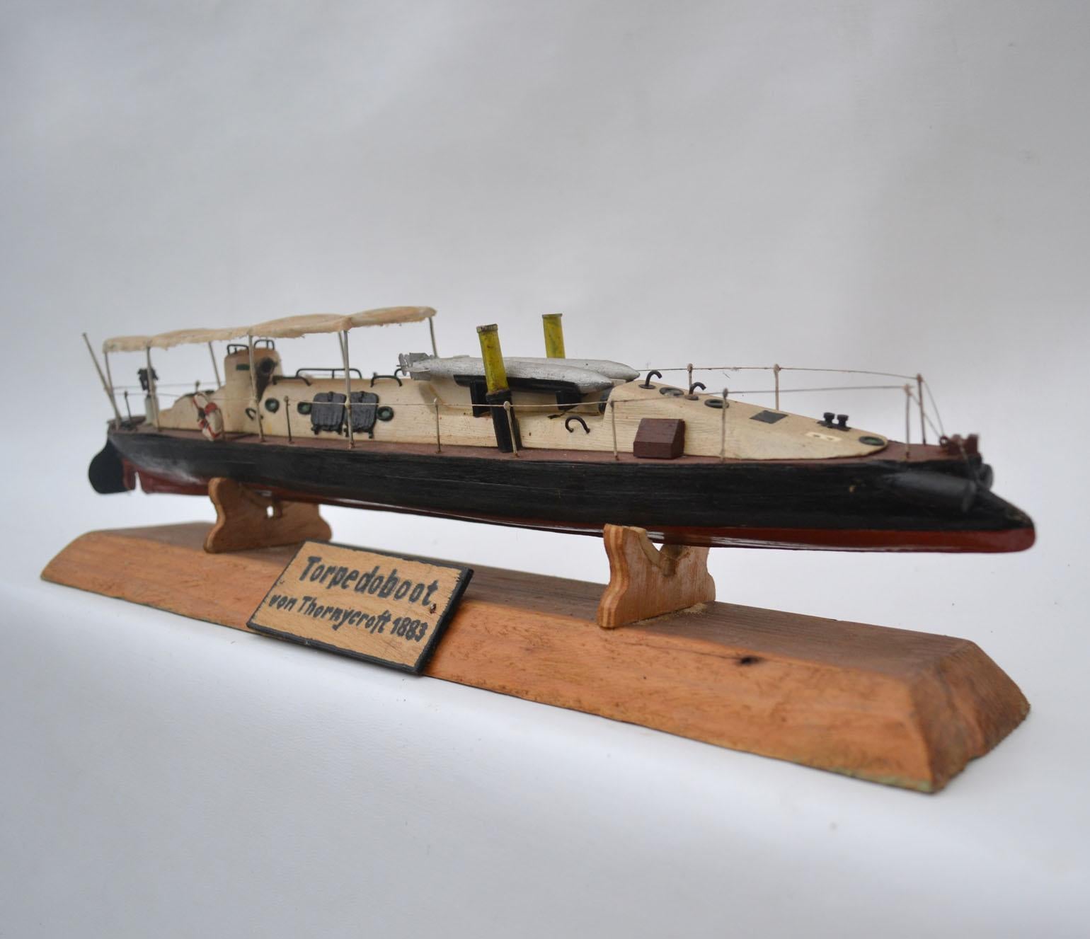 Model of an early Torpedo ship was handcrafted between early to mid 20th century in Eastern Europe. This Torpedo boat is a relatively small and fast naval ship that was designed to carry torpedoes into battle. 
This a highly detailed model came from