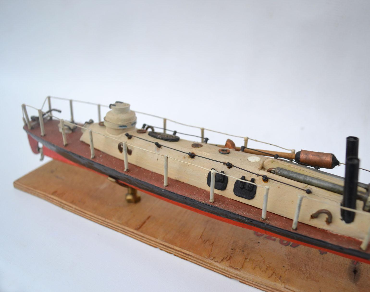 Model of an early torpedo ship was handcrafted between early to mid-20th century in Eastern Europe. This Torpedo boat is a relatively small and fast naval ship that was designed to carry torpedoes into battle. The yarrow torpedo boat was most likely