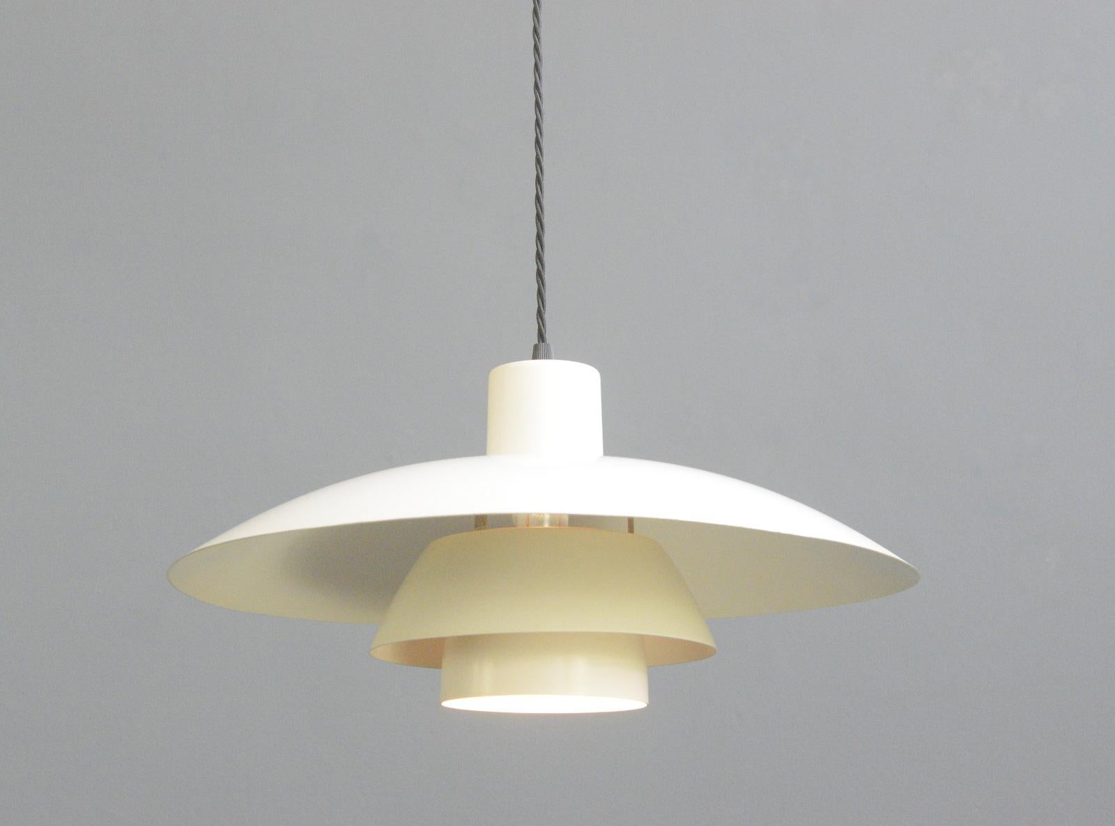 Model PH4 pendant lights by Louis Poulson Circa 1960s

- Comes with 150cm of cable
- Takes E27 fitting bulbs
- Made from aluminium
- Designed by Poul Henningsen
- Made by Louis Poulson
- Model PH4
- Danish ~ 1960s
- 40cm wide x 20cm