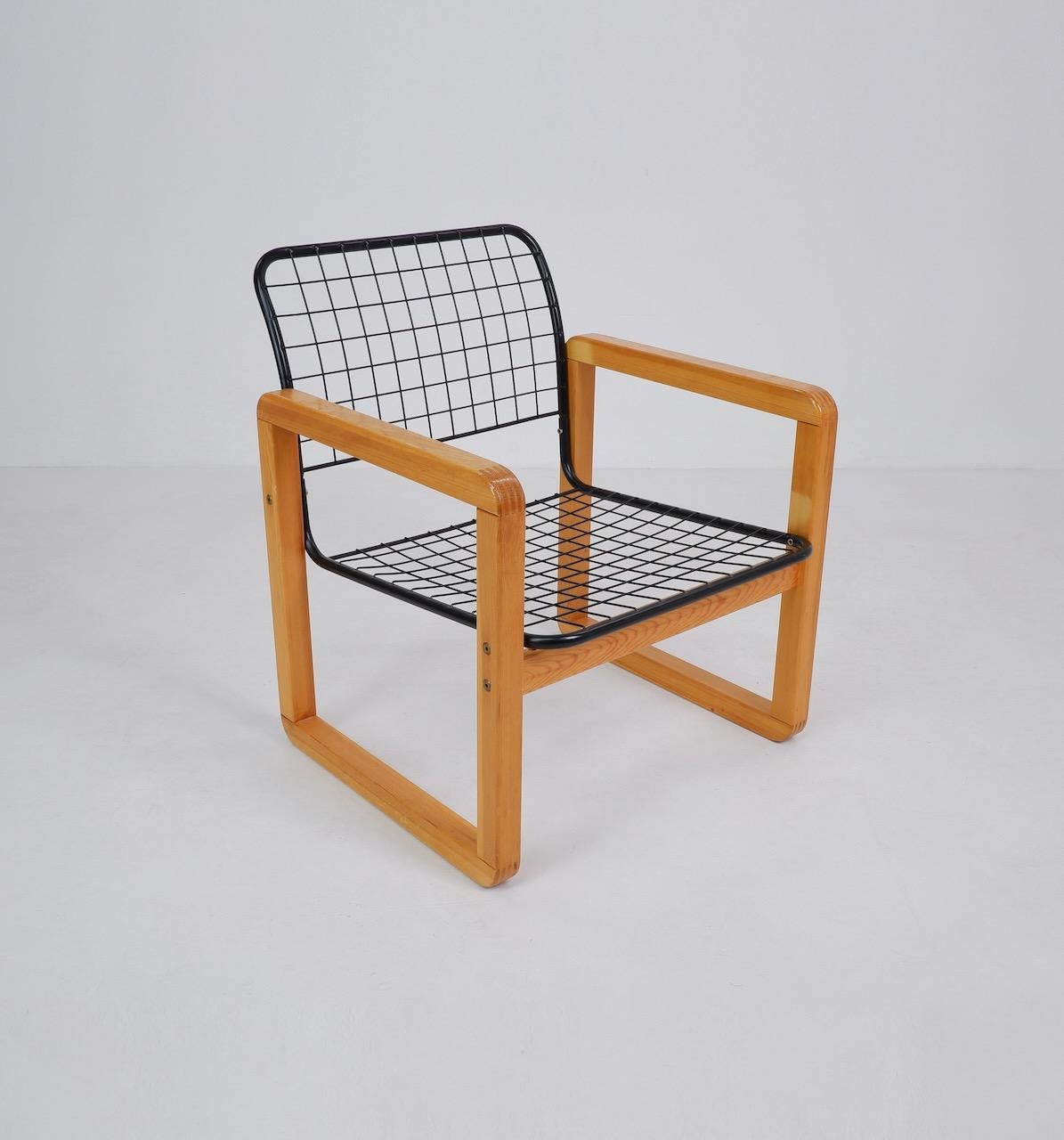 Pine wood and steel side chair designed by Knut & Marianne Hagberg in 1982 and produced by Ikea for 2 years in the early 1980s. This model is the rarer version of the more widely produced canvas upholstered alternative. 

Dimensions (cm, approx):