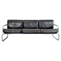 Model "T3" sofa in black leather with chrome-plated tubular steel frame