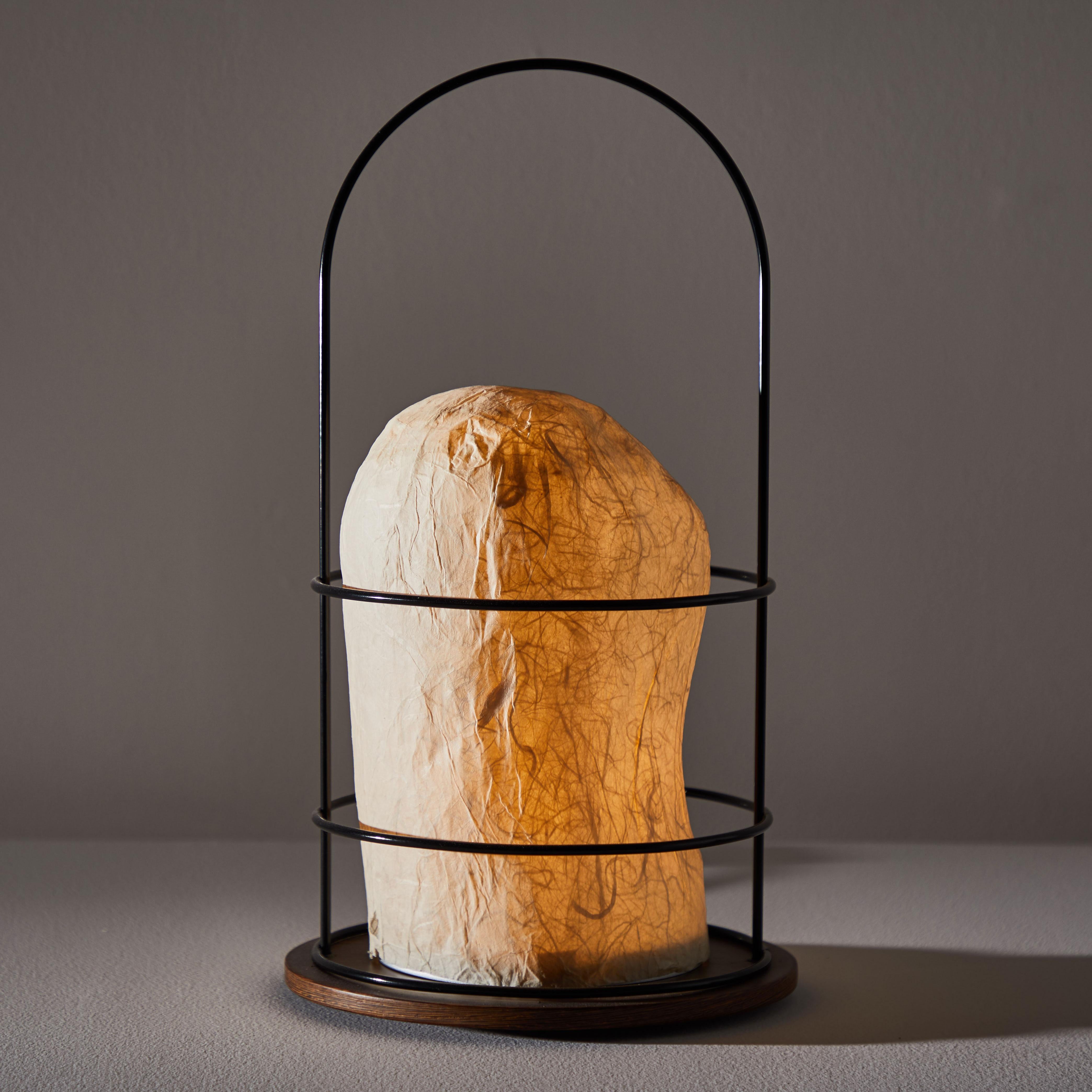 Model WL 01 A table lamp by Andrea Branzi. Designed and manufactured in Milan, 1995-1996. Black metal wire, wood, rice paper. Original cord. Takes one E27 25w maximum bulb. Bulbs provided as a one time courtesy. Literature: Fiell, Charlotte & Peter,