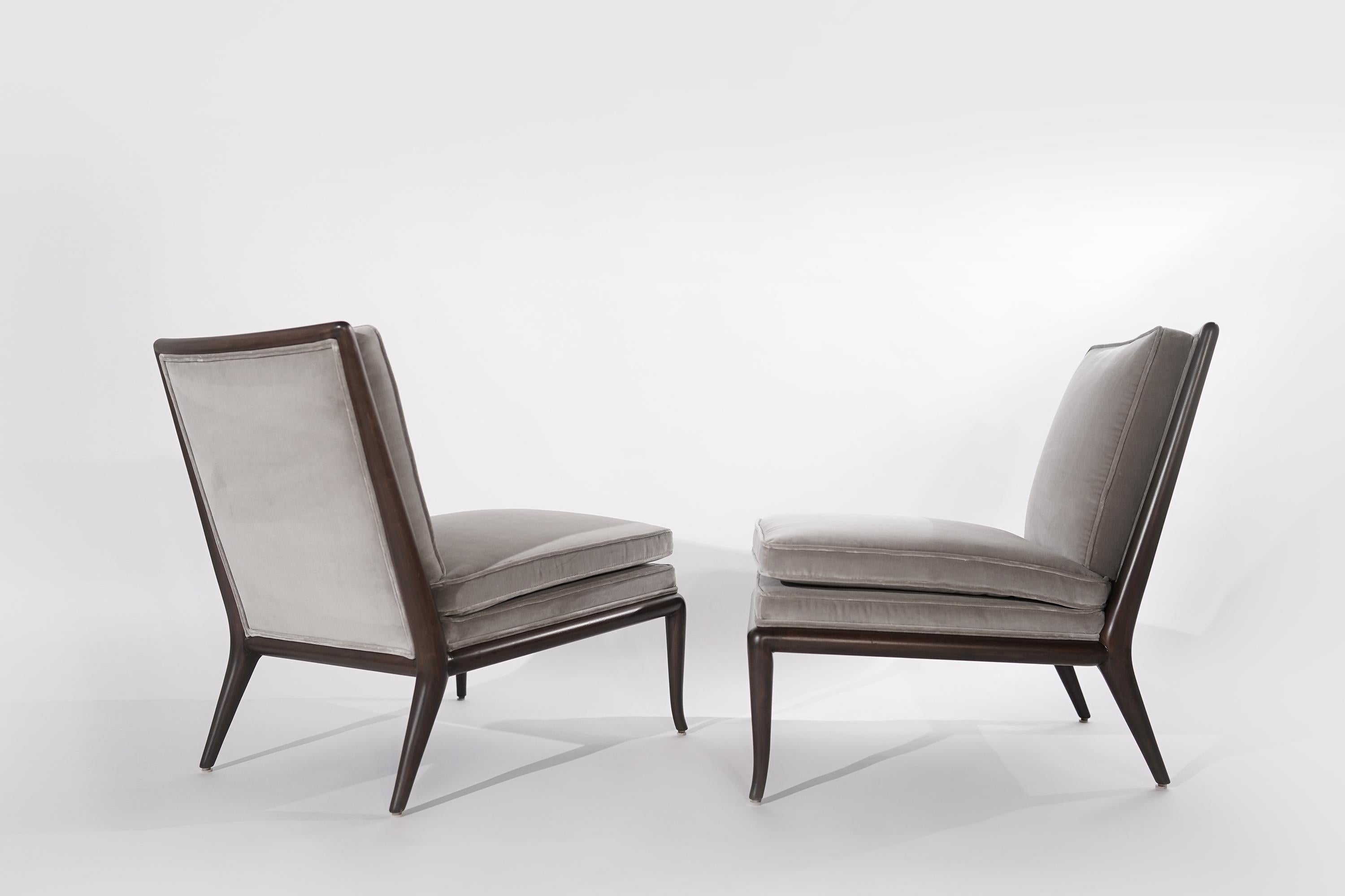 Pair of slipper chairs, model WMB designed by T.H. Robsjohn-Gibbings for Widdicomb, circa 1950-1959. Each in a fully restored walnut frame and newly upholstered in grey velvet by Holly Hunt. 

Other designers from this period include Paul McCobb,
