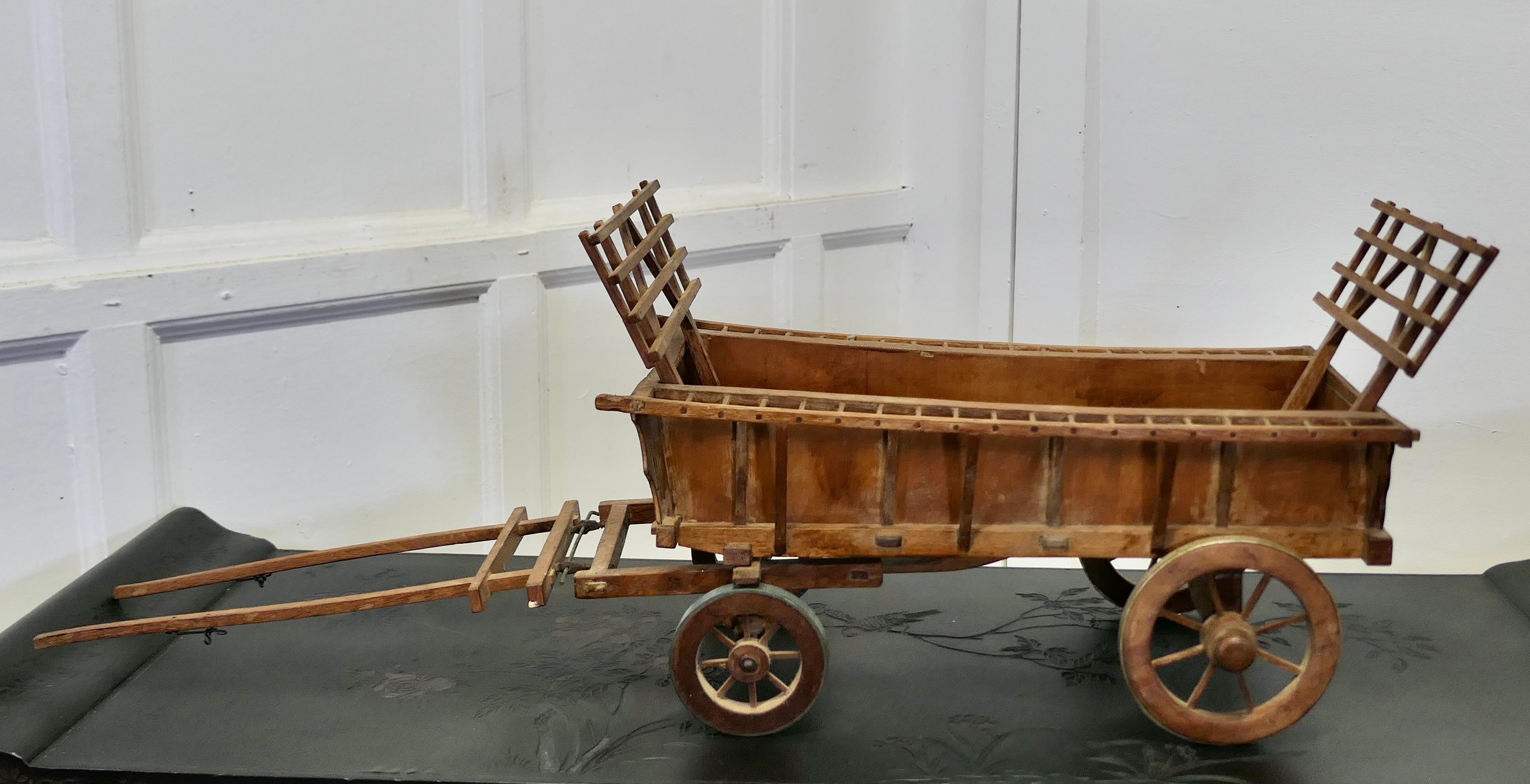 Model Wooden Horse Drawn Hay Cart

This is a trim little Wagon, it is made mainly in Oak and comes in a natural wood finish, with removable hay gates and metal bound wheels
This charming little cart would make an excellent display piece
The cart is