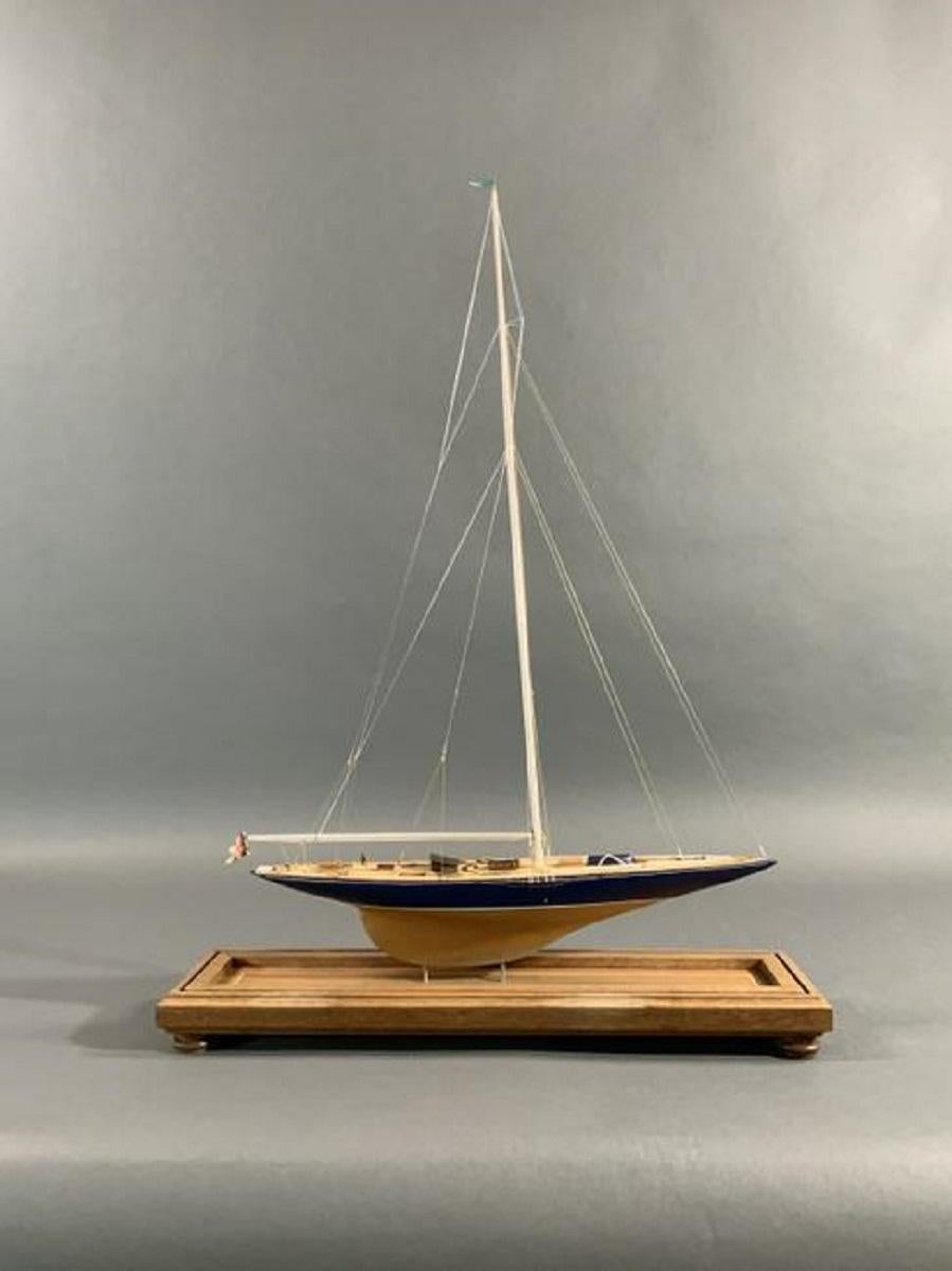 Fine model of the 1934 J class yacht Endeavour by noted model maker William Hitchcock. With planked deck, brass skylights, winches, wheels, etc. Rigged with mast, Park Avenue boom and all appropriate rigging. Model circa 1980. Fitted to a display