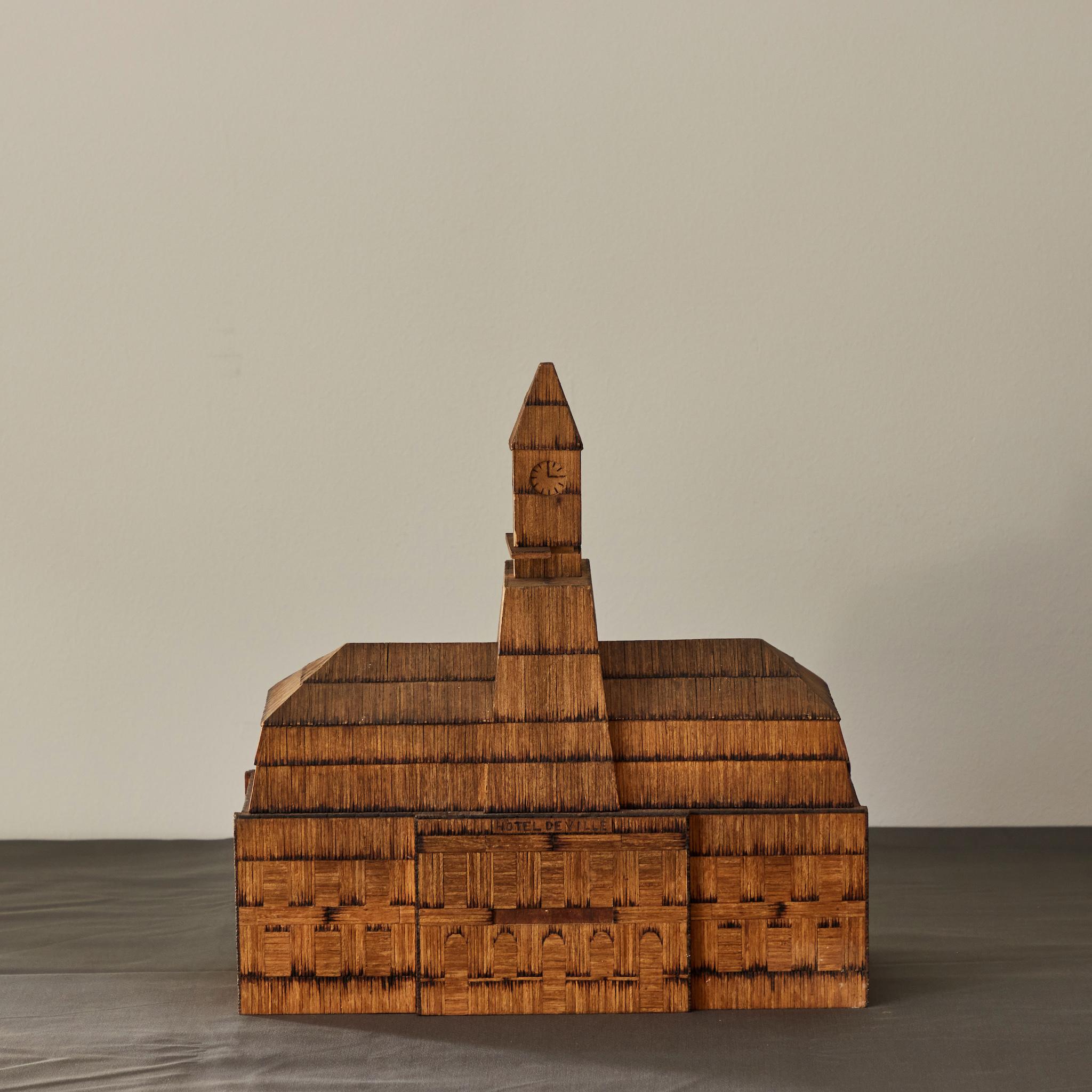 Set of two French handcrafted matchwork models of buildings. An exemplary work of folk art, the attention to detail is exquisite, the wood aged to a beautiful, rich honey color. The first model is of the 