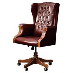 Modenese Gastone Swivel Armchair in Bordeaux Leather with Capitone Bottons