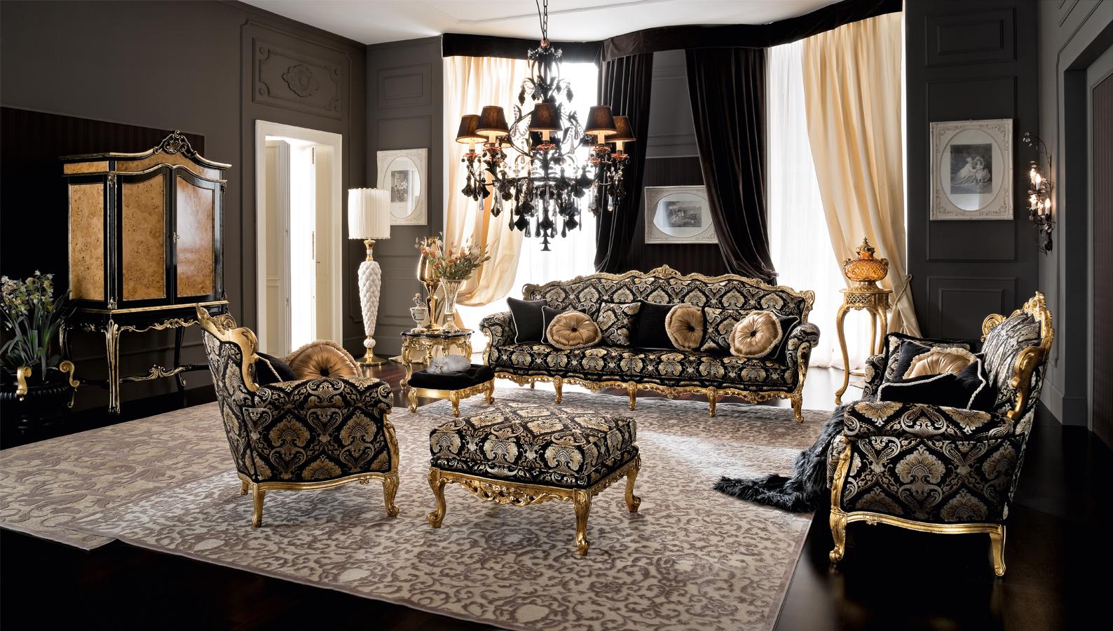 Petit pouf baroque avec tissu damassé et base en bois massif doré à la feuille. Ce tabouret rembourré est parfait s'il est combiné avec le fauteuil noir baroque conçu et produit par Modenese pour meubler des intérieurs de luxe.
 