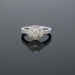 Modern 0.63 Carat Diamond Halo Cluster Platinum Engagement Ring