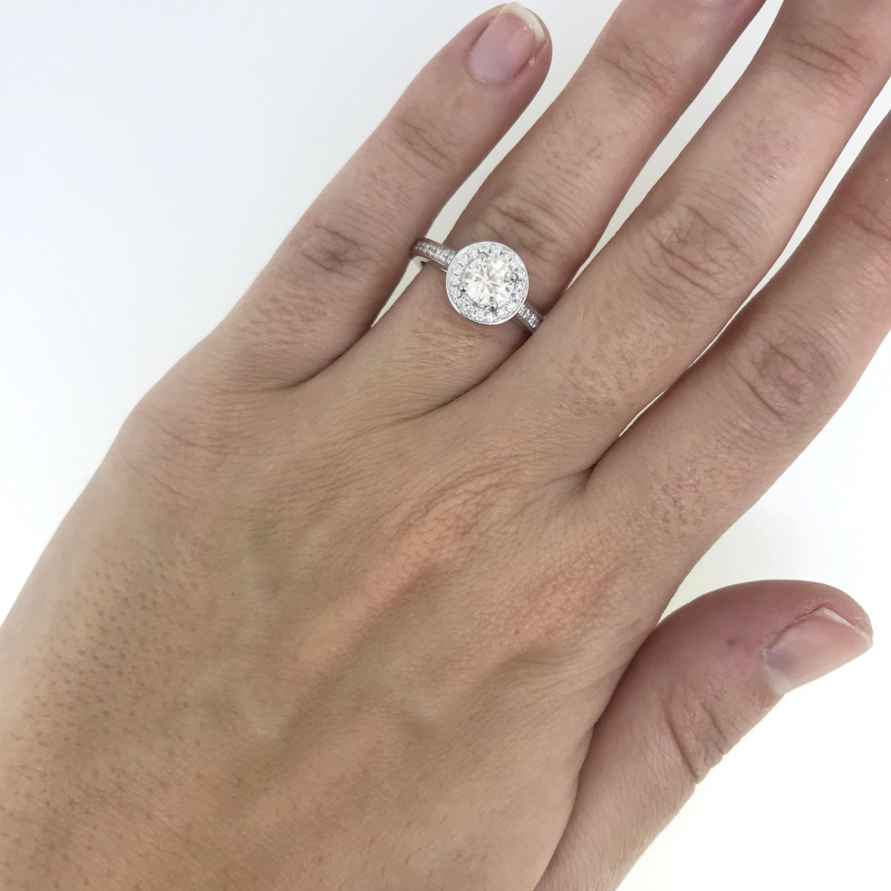 Modern 0.63 Carat Diamond Halo Cluster Platinum Engagement Ring For Sale 2