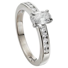Modern 0.65ct Oval Diamond Engagement Ring in 18K White Gold