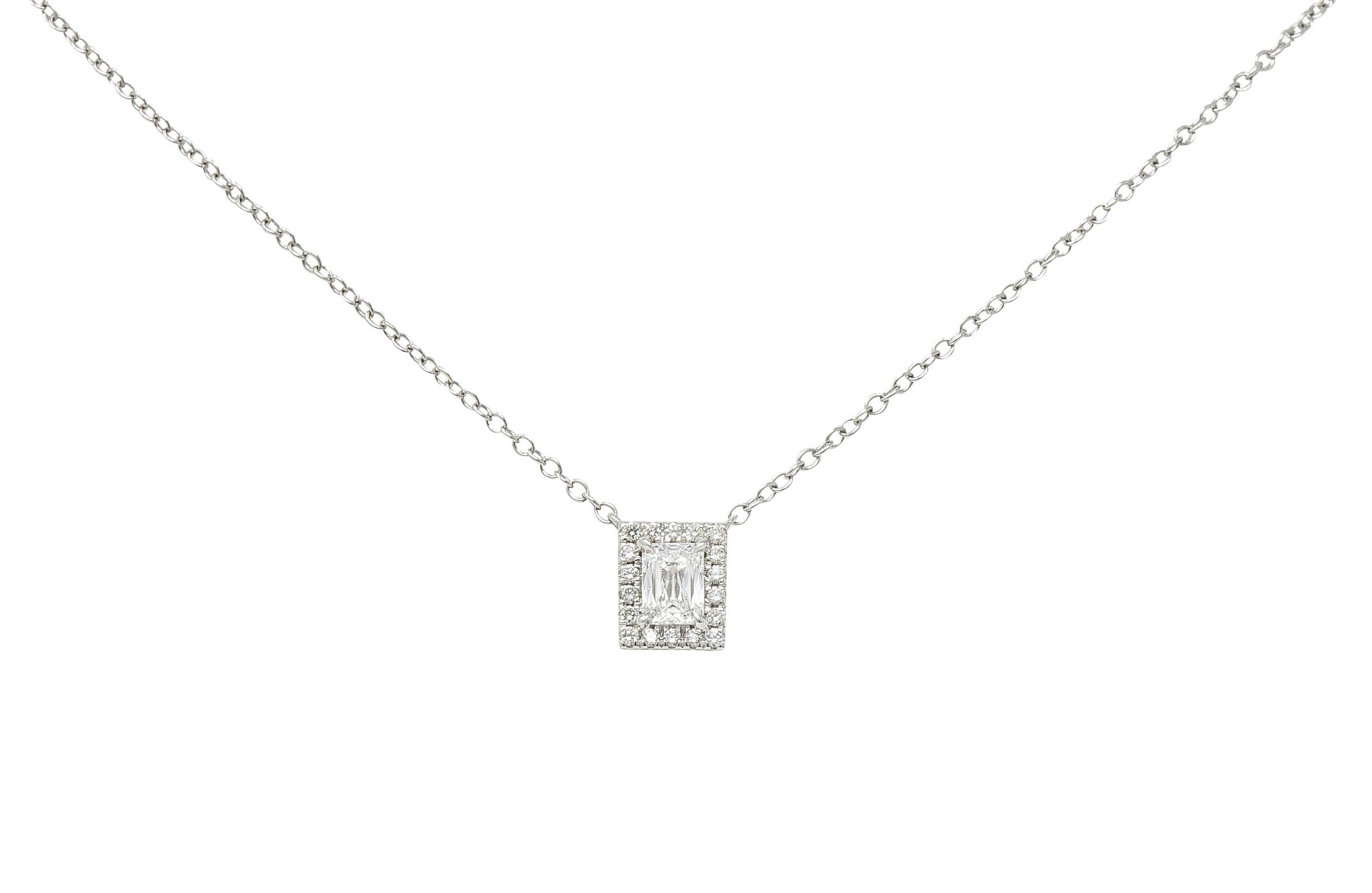 Classic cable chain necklace centers a rectangular diamond station - fixed in place

Featuring a crisscut diamond weighing approximately 0.50 carat - E color with VS clarity

With a round brilliant diamond halo weighing in total approximately 0.20