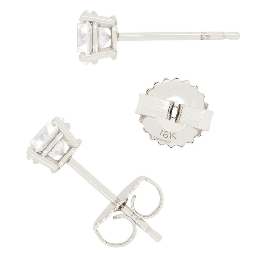These classic round brilliant studs are perfect for every day wear. They weigh 0.50 carat a piece and are of high quality, being graded G in colour and VS2 in clarity. Simply set in a four claw 18 carat white gold mount, the diamonds’ beauty is