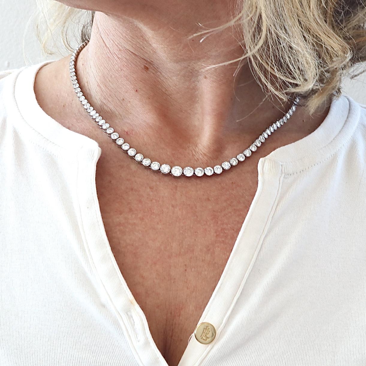 The perfect layering necklace to add sparkle and drama to your other chains and pendants. Featuring 13.72 carats of round brilliant diamonds, this necklace is demure enough to be worn with jeans and elegant enough to dress up your LBD. The 119