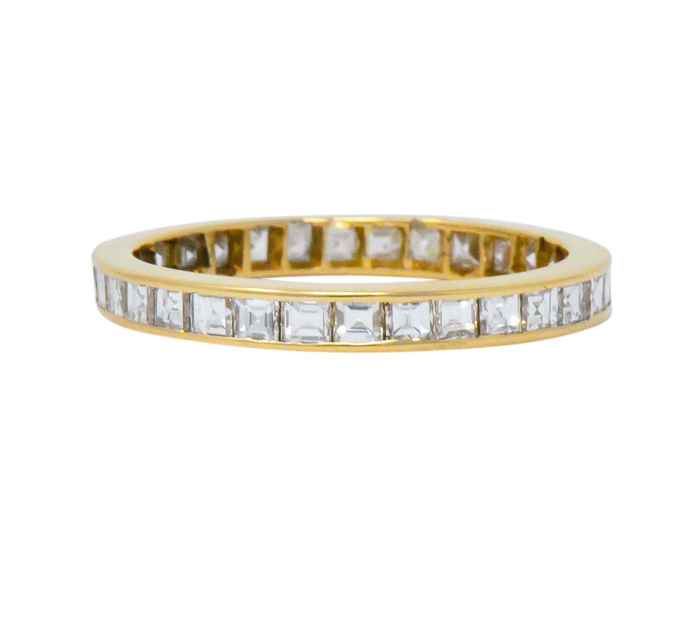 Set all the way around with square step cut diamonds

Thirty-two diamonds total, weighing approximately 1.30 carats, G/H color and VS to SI clarity

Channel  set for a sleek look

Tested as 14 karat gold

Ring Size: 5 & Not Sizable

Top measures 2.3