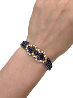 Modern 14 Karat Gold 32.00 Carat Cabochon Sapphire 1.35 Carat Diamond Bracelet