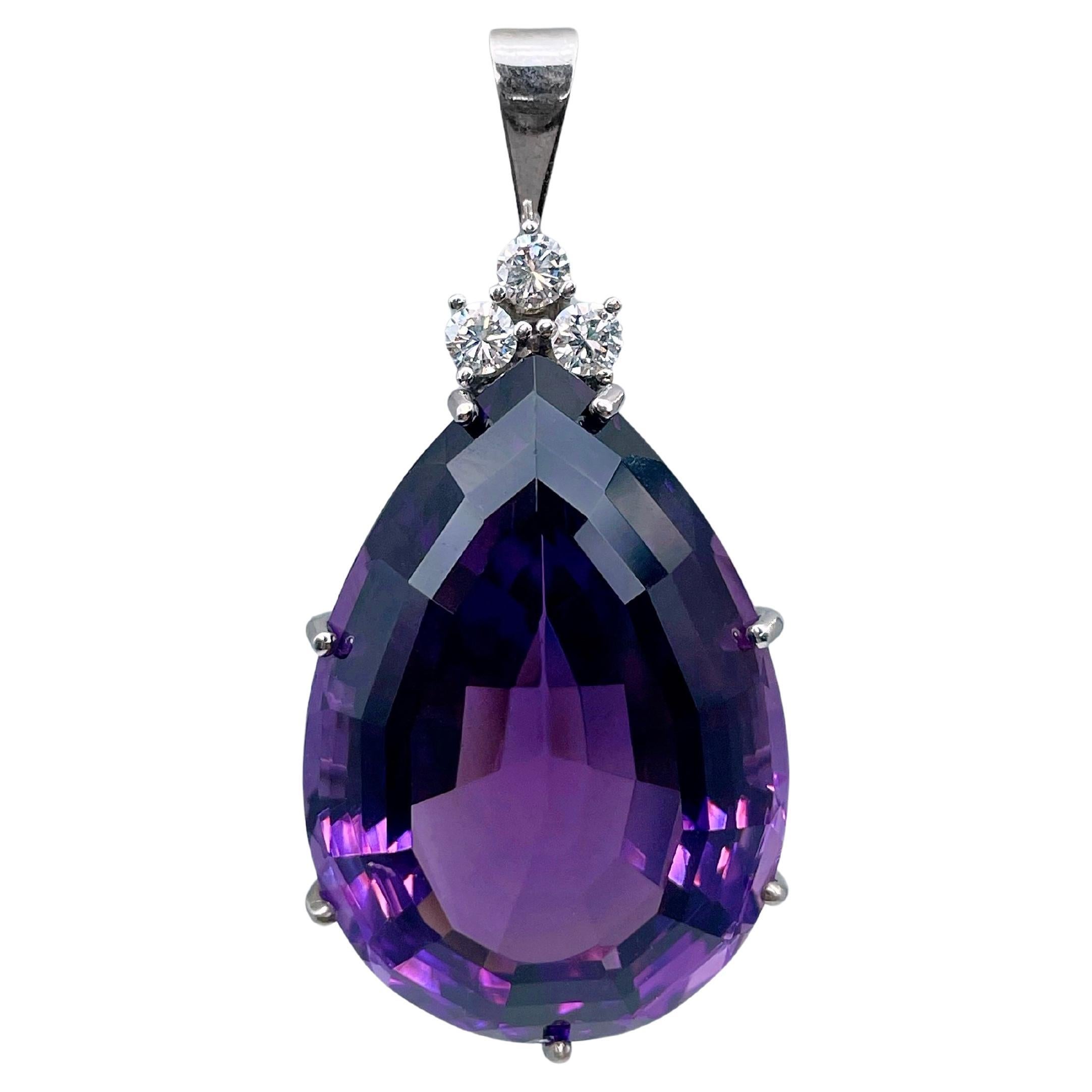 Modern 14 Karat Gold 40.00 Carat Pear Cut Amethyst 0.31 Carat Diamond Pendant For Sale