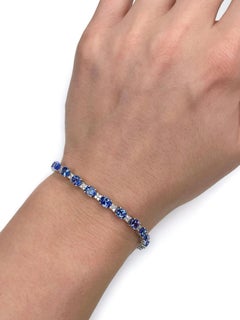 Moderna pulsera de tenis de oro blanco de 14 quilates con tanzanita y diamantes de 0,70 quilates