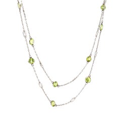 Modern 14.48 carat peridot platinum by the yard necklace
