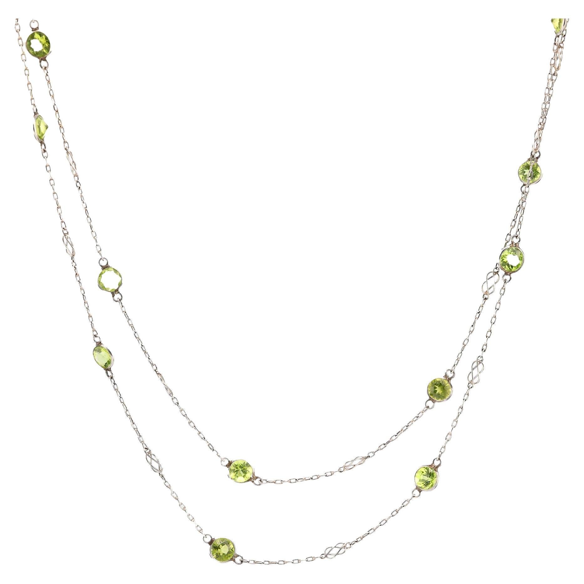 Modern 14.48 carat peridot platinum by the yard necklace For Sale