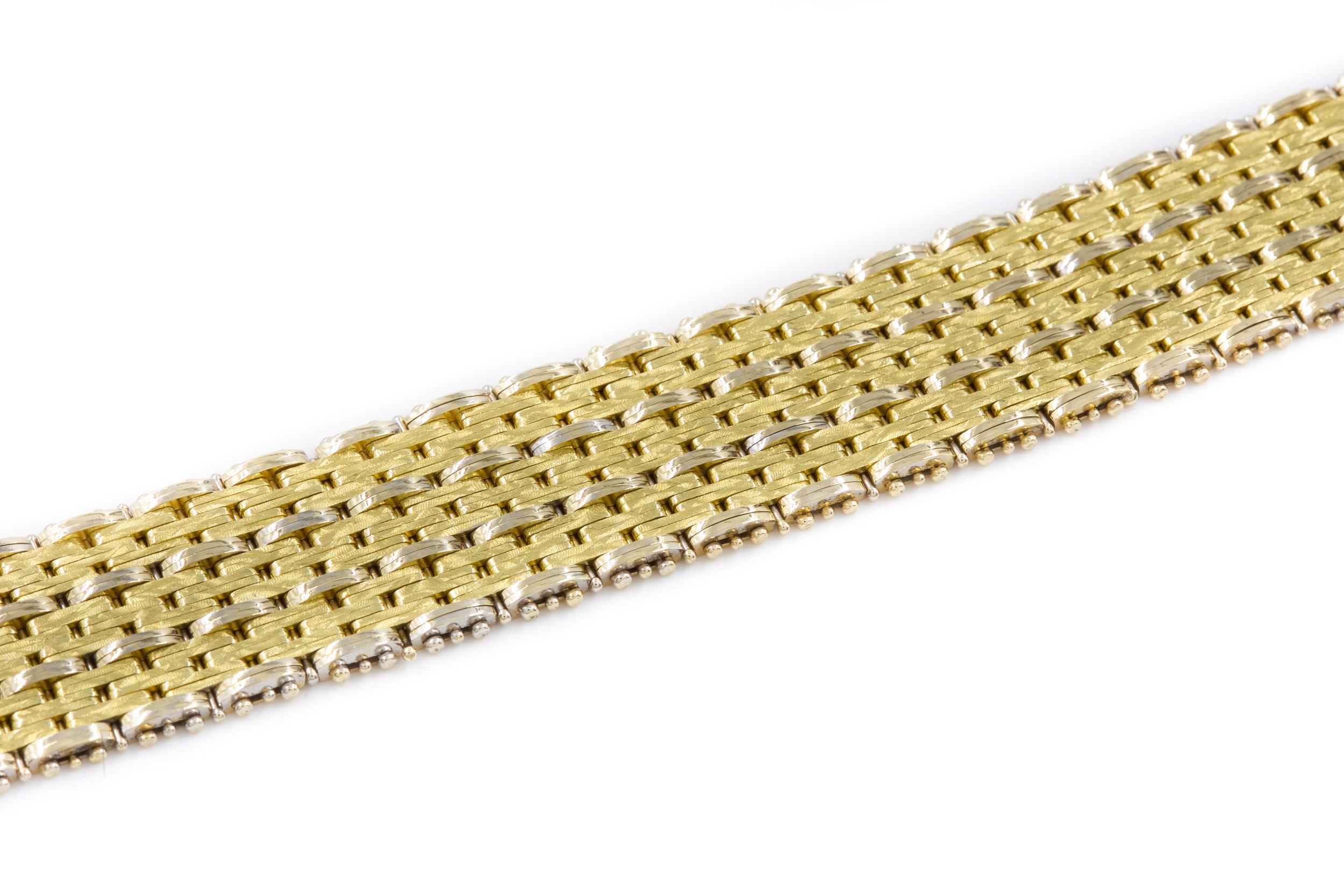 BEAUTIFULLY TEXTURED AND WOVEN 14K BICOLOR GOLD STRAP BRACELET
7 1/2