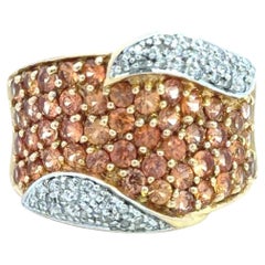 Moderner Ring aus 14-karätigem Gold mit orangefarbenem Saphir und Diamanten