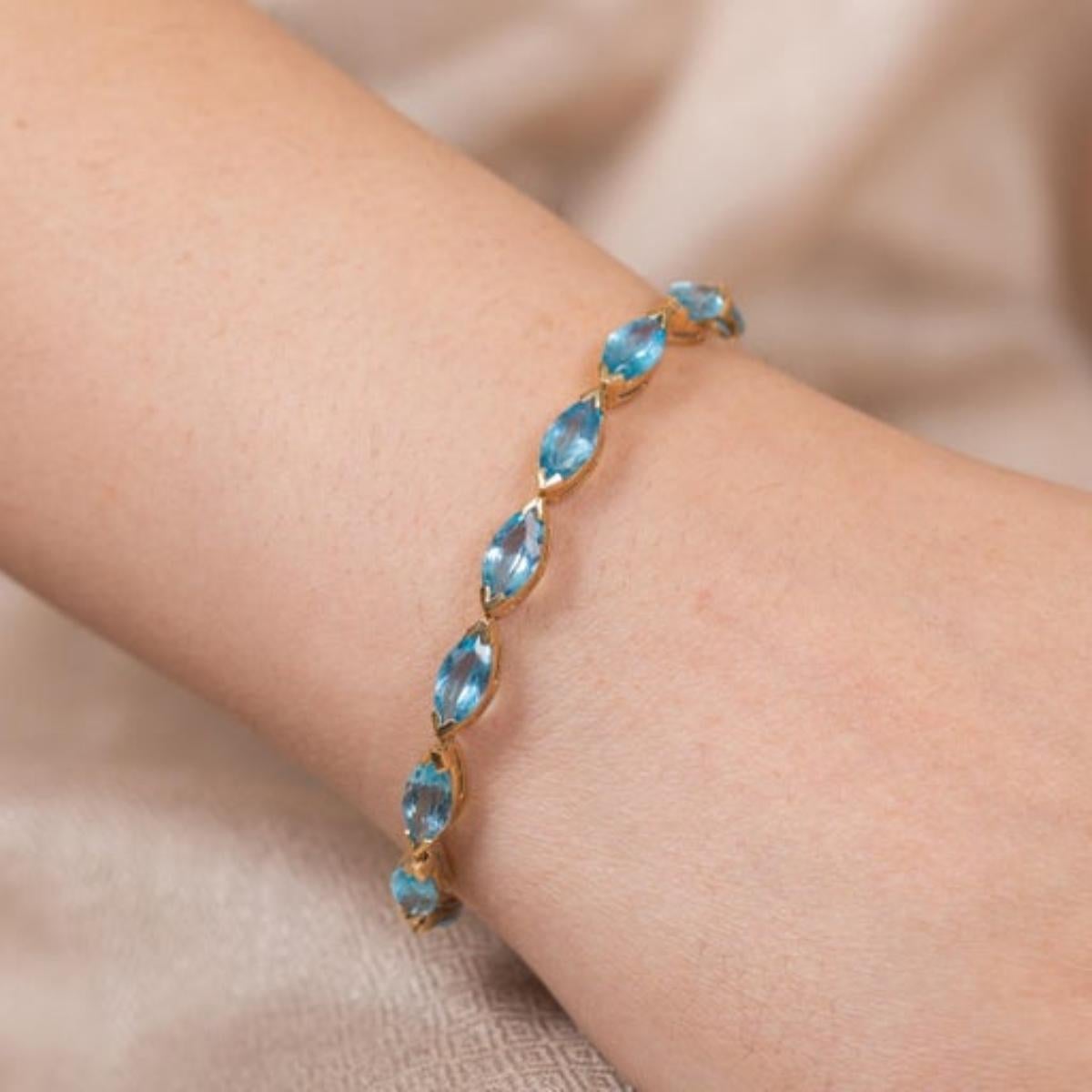 Women's Modern 14k Solid Yellow Gold 18.9 CTW Marquise Cut Blue Topaz Tennis Bracelet For Sale