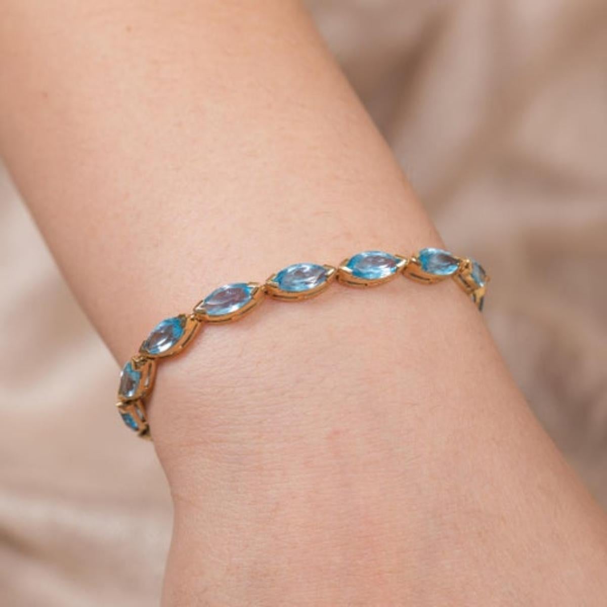 Modern 14k Solid Yellow Gold 18.9 CTW Marquise Cut Blue Topaz Tennis Bracelet For Sale 2