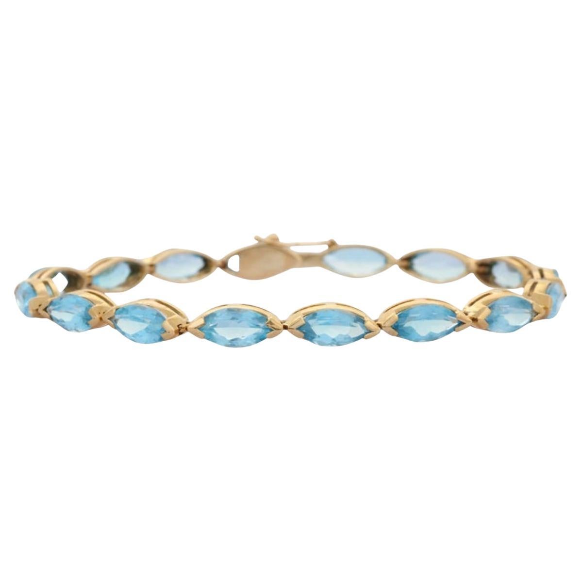 Modern 14k Solid Yellow Gold 18.9 CTW Marquise Cut Blue Topaz Tennis Bracelet