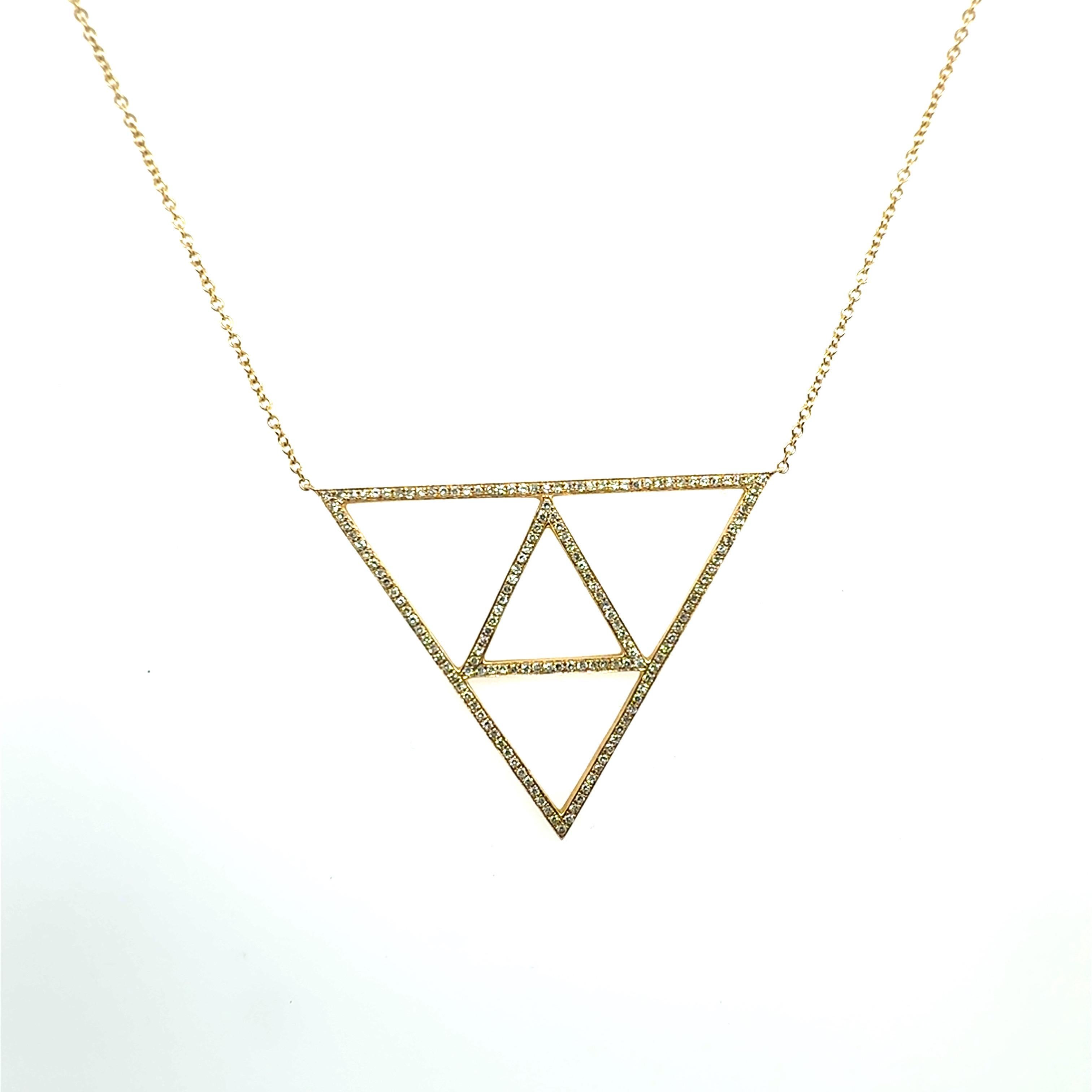 This modern yellow gold triangular statement pendant is set with a total approximate 0.50 CARAT of natural diamonds, composed of approximately 155 natural round brilliant–cut diamonds. The diamonds are graded approximate G–I in color and SI–I in