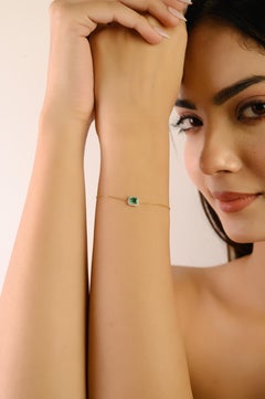 Modern 14K Yellow Gold Chain Bracelet with Emerald-Cut Emerald & Diamond Halo