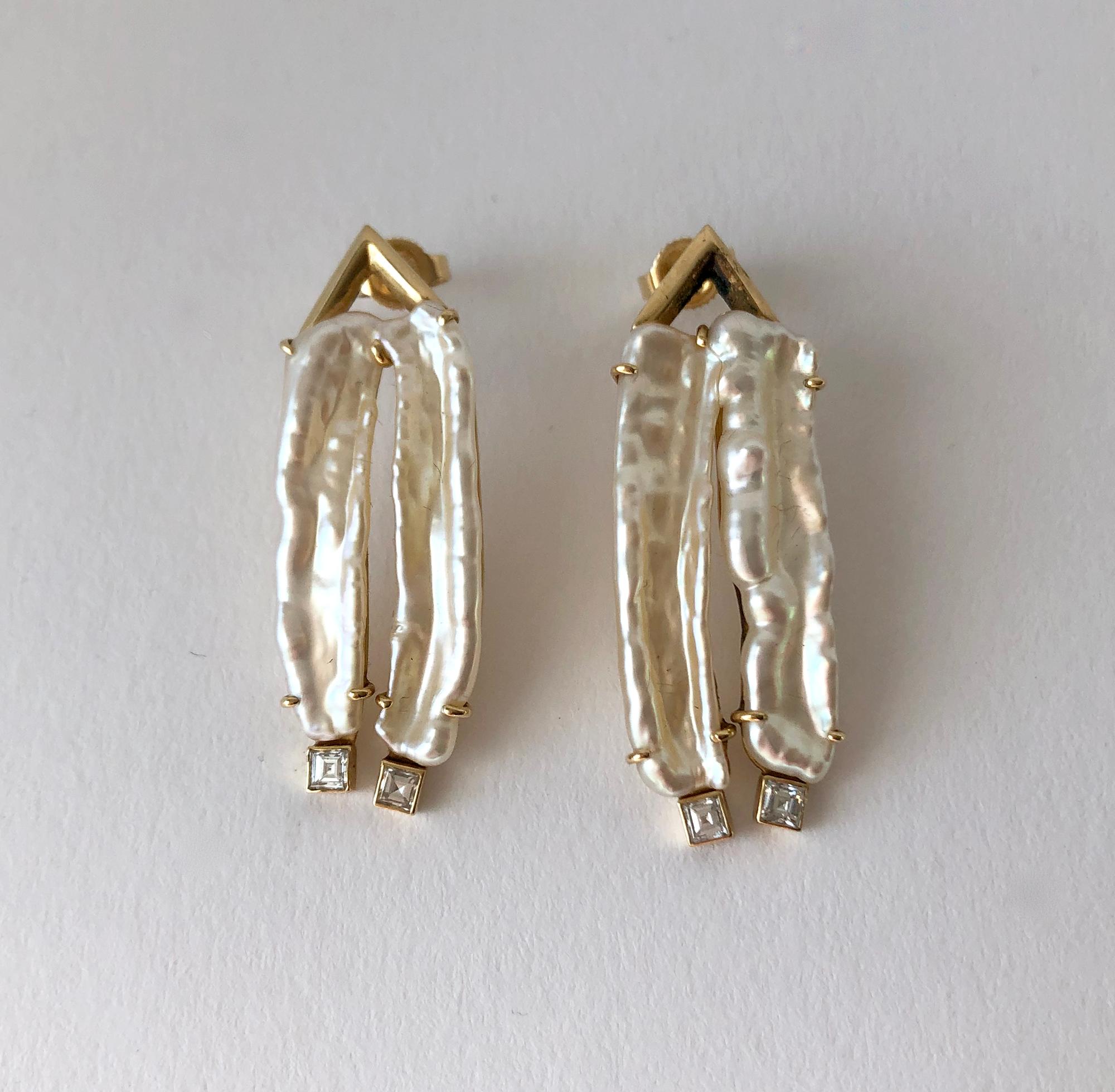 Modern 14K gold pierced earrings with step cut diamonds and freshwater stick pearls, creator unknown.  Earrings measure 1.5