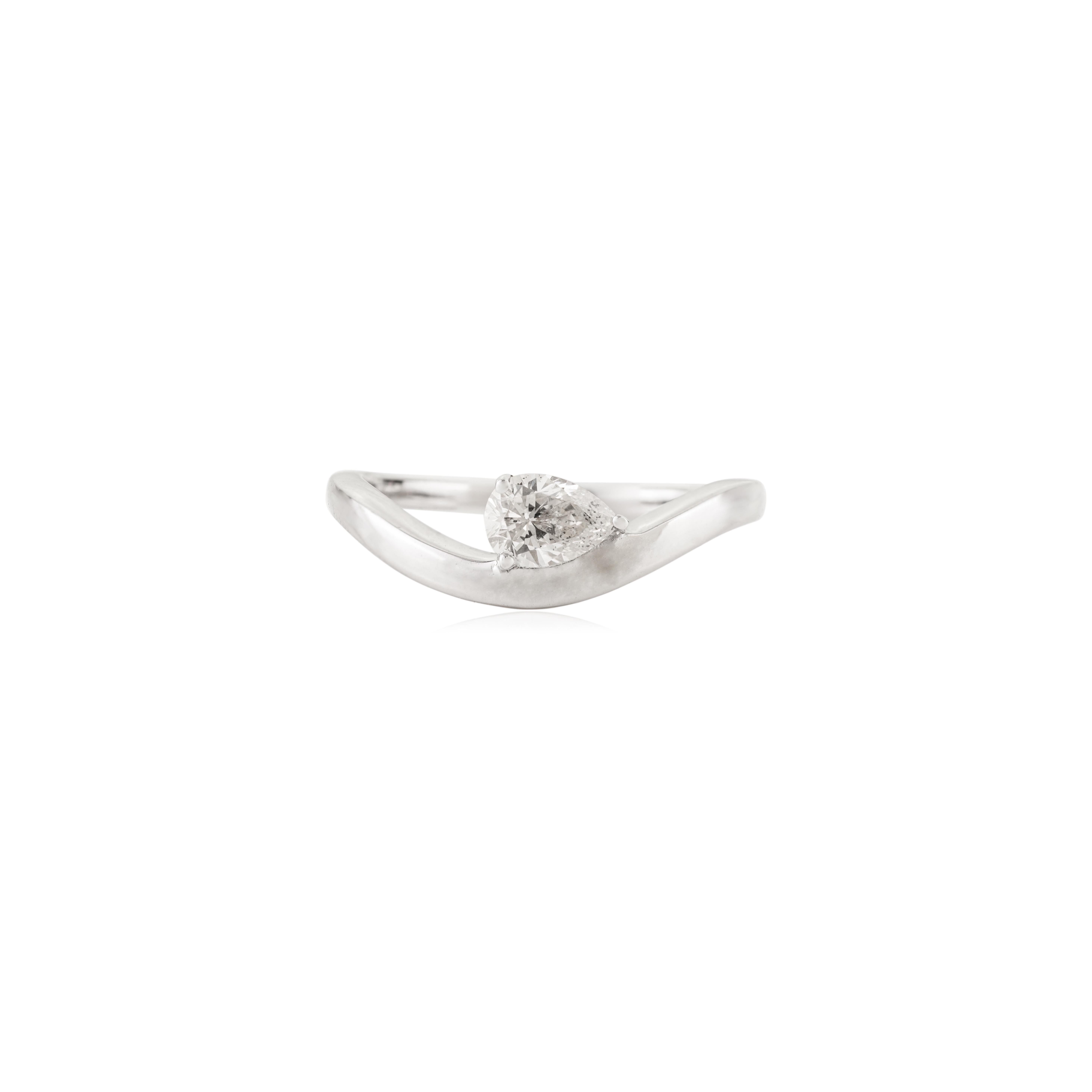 For Sale:  Modern 1.5 Ct Pear Cut Diamond Solitaire Wave Ring in 18K White Gold Prong Set