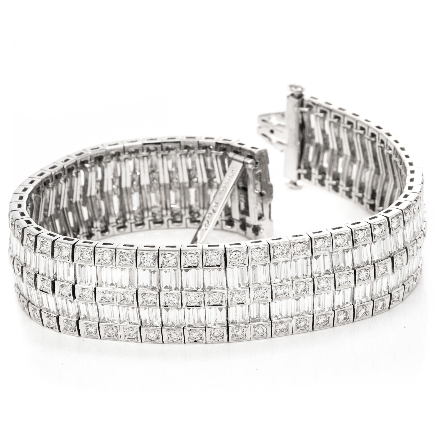 Add Character and Luxury to your everyday use.

This very sparkly Diamond bracelet was crafted in luxurious Platinum.

A double row of High-Quality Icy White Baguette Cut Diamonds & a triple row of Round cut diamonds are handsomely set into this