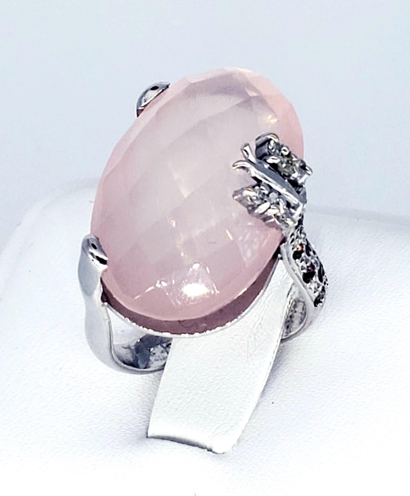 Modern 16.78 Carat Rose & Diamonds Quartz Butterfly Cocktail Ring 18k White Gold. The ring features a beautiful work of art by Brazilian jewelry designer Patricia Dias. The rose quartz stone is nicknamed “The stone of love” and measures