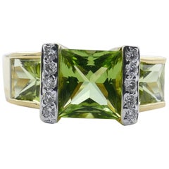 Modern 18 Carat Yellow Gold Peridot and Diamond Dress Ring