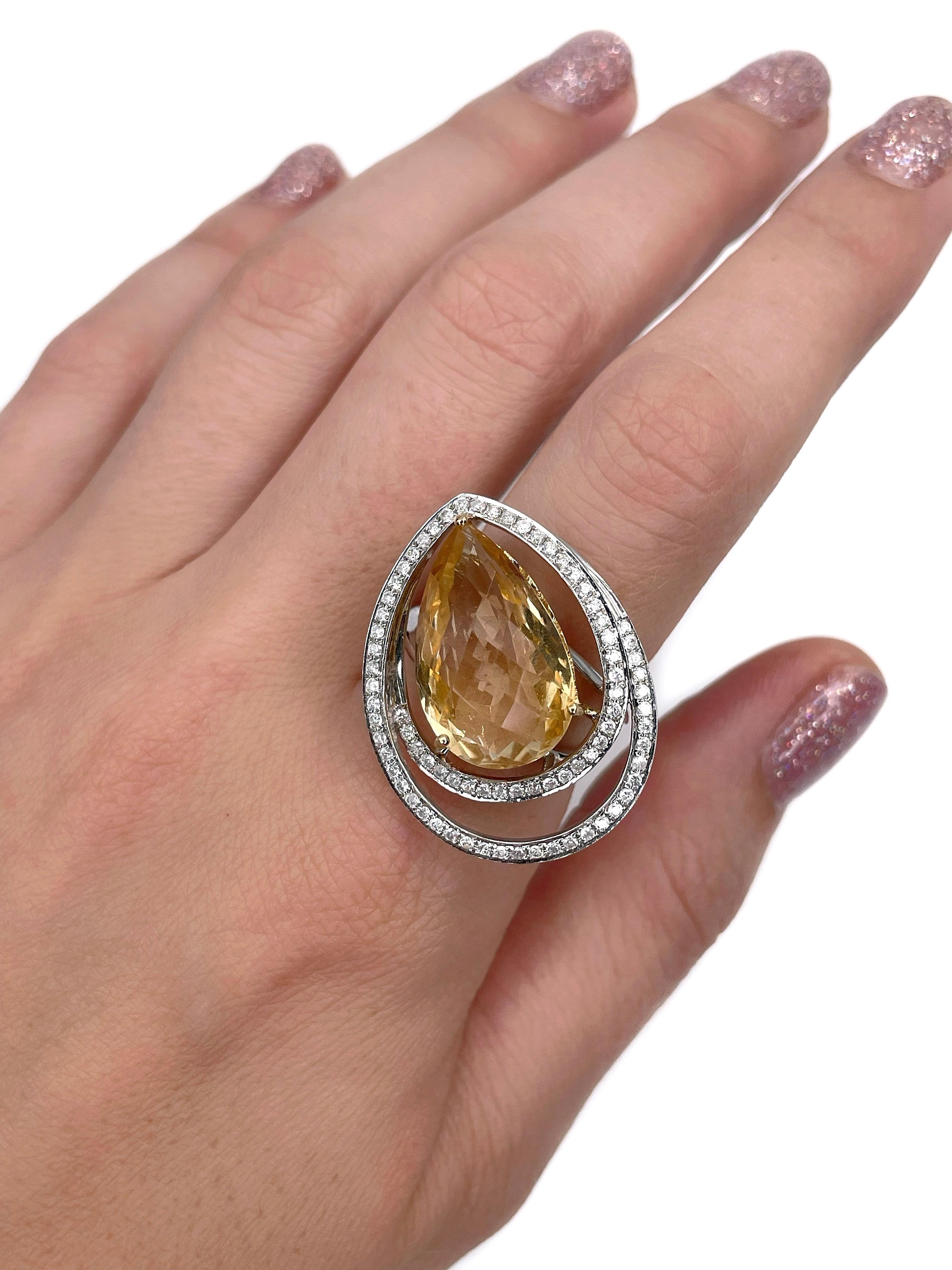 This is a gorgeous modern design cocktail ring crafted in 18K white gold. Circa 2000. 

The piece features:
- 1 citrine (pear cut, 10.70ct, Y 2/2, VS)
- 77 diamonds (round brilliant cut, TW 0.50ct, RW-STW, SI2-P3) 

Weight: 10.65g
Size: 17.25