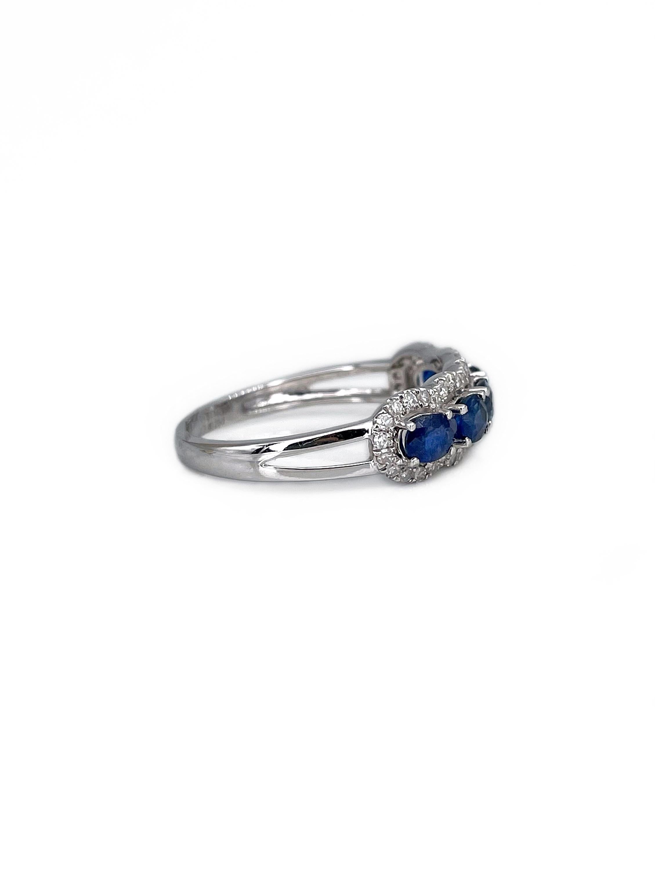 This is a modern band ring crafted in 18K white gold. The piece features 5 oval blue sapphires: TW 1.25ct, vB 5/4, VS-SI, H. The gems are accompanied with 44pcs. single cut diamonds: TW 0.22ct, W-STW, SI-P2.

Weight: 2.24g 
Size: 17.5 (US