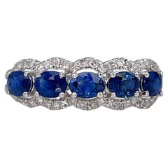 Vintage Modern 18 Karat Gold 1.25 Carat Sapphire 0.22 Carat Diamond Band Ring