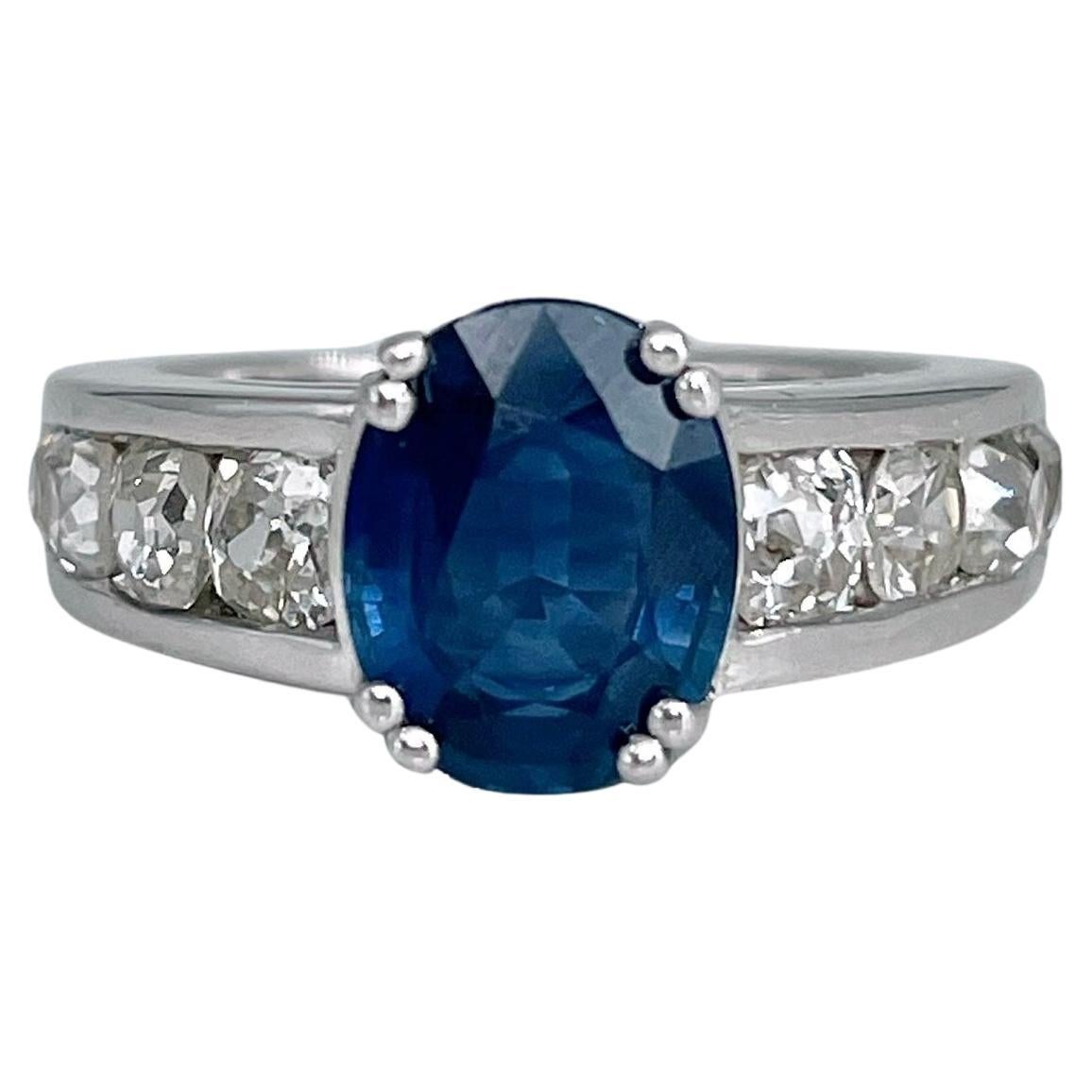 Modern 18 Karat Gold 1.75 Carat SI Sapphire 1.40 Carat Diamond Engagement Ring For Sale