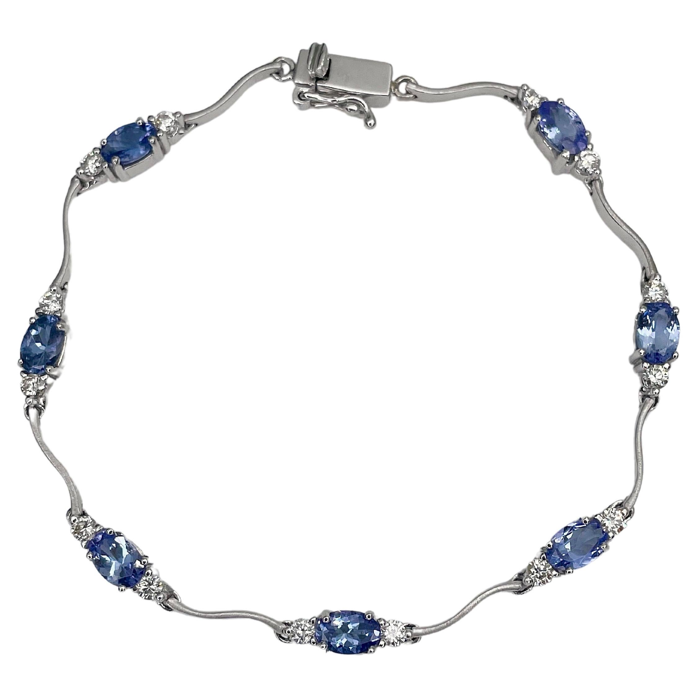 Pulsera de tenis moderna de oro de 18 quilates con tanzanita de 2,5 quilates y diamantes de 0,81 quilates
