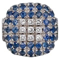 Modern 18 Karat Gold 5.32 Carat Sapphire 0.405 Carat Diamond Cocktail Ring