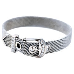 Bracelet moderne avec boucle de ceinture en or 18 carats et diamants