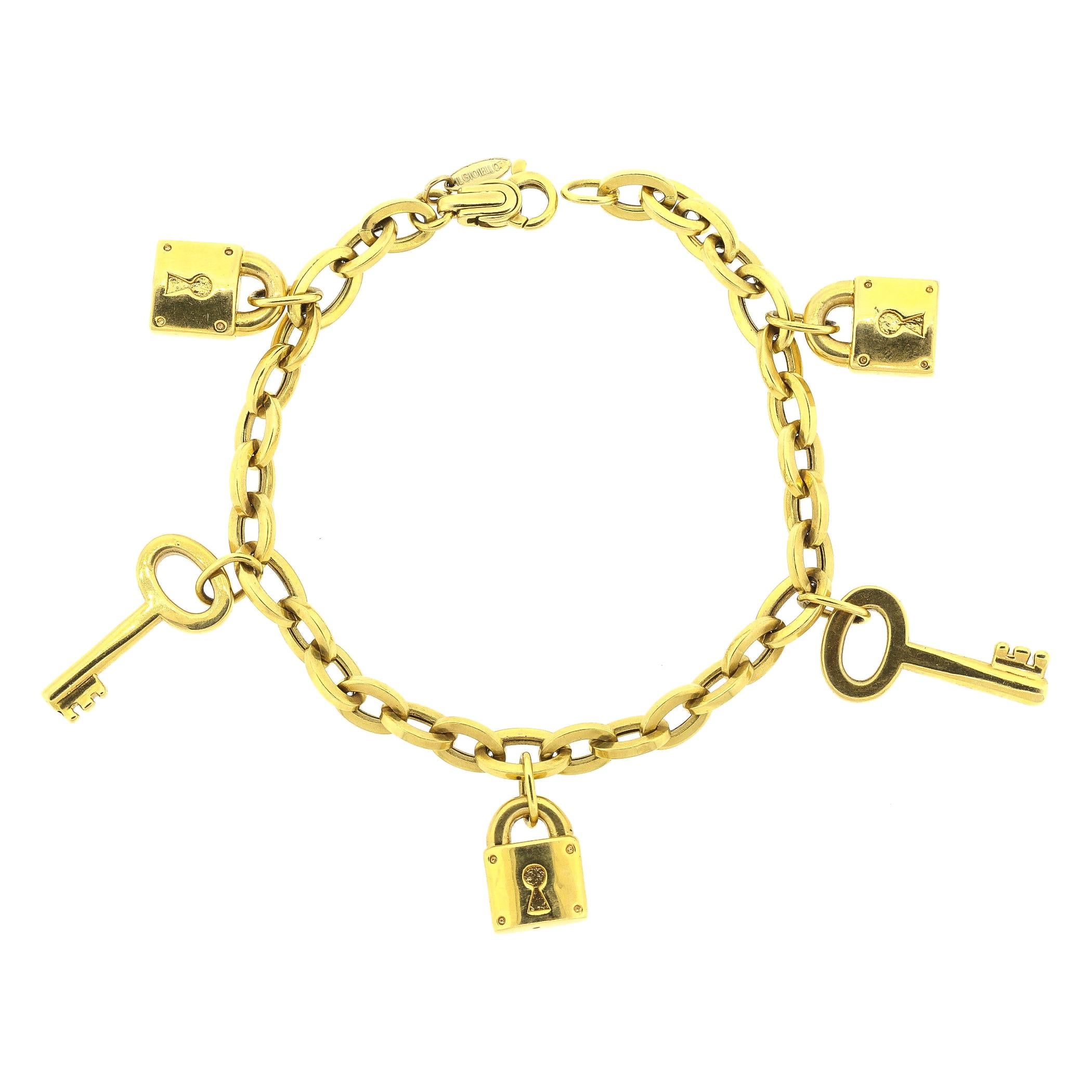 Modern 18 Karat Gold Padlock and Key Charm Bracelet For Sale