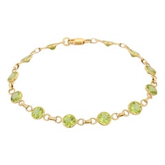 Modernes modernes Gliederarmband aus 18 Karat massivem Gelbgold mit Peridot und Edelsteinen